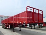 Side Gate and Fence Truck Driving Large Cargo Trailer